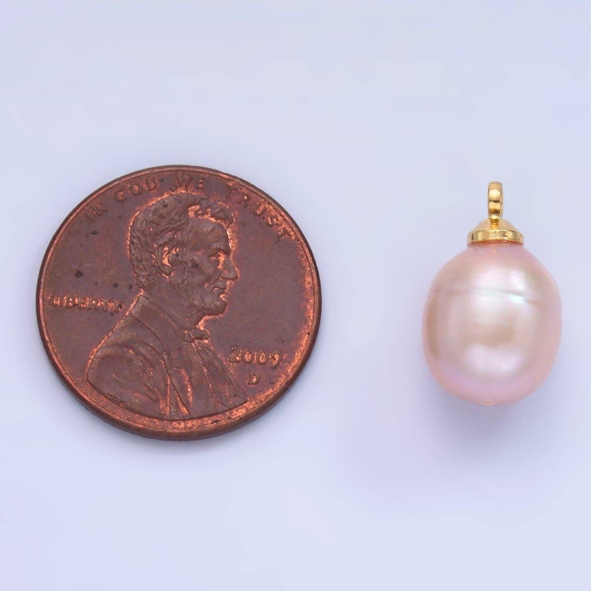 light pink pearl charm