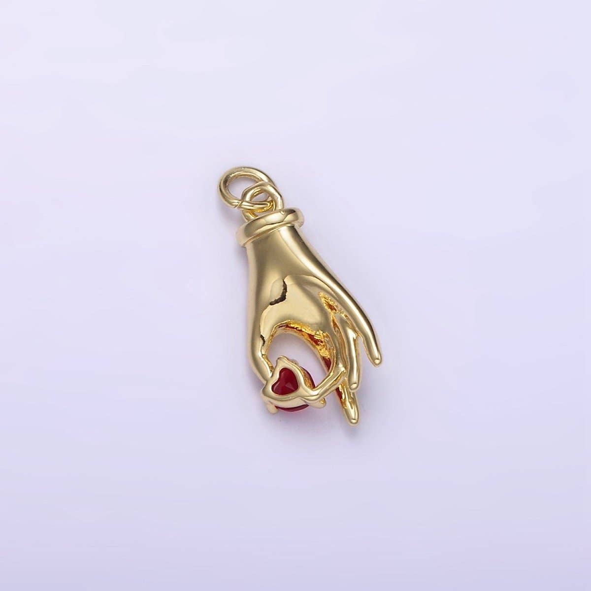 red gem hand charm