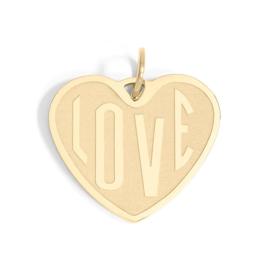 Gold heart-shaped pendant with 'LOVE' engraving on a white background
