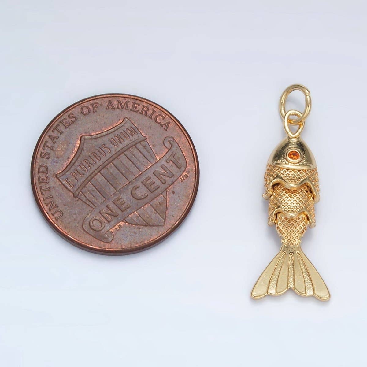 golden gem fish charm